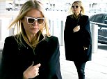 *EXCLUSIVE* New York, NY - Oscar-winner actress Gwyneth Paltrow bundles up ahead of a departing flight from JFK Airport. Gwyneth, who 'consciously uncoupled' from estranged husband, Coldplay singer Chris Martin last year, is currently dating Scream Queens producer Brad Falchuk. The actress has been busy promoting her new line of GOOP organic skincare products, and revealed she is retiring from acting to focus on growing the lifestyle company.\nAKM-GSI      March 20, 2016\nTo License These Photos, Please Contact :\nSteve Ginsburg\n(310) 505-8447\n(323) 423-9397\nsteve@akmgsi.com\nsales@akmgsi.com\nor\nMaria Buda\n(917) 242-1505\nmbuda@akmgsi.com\nginsburgspalyinc@gmail.com