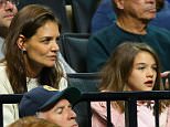 20 March 2016: Katie Holmes and daughter Suri Cruise during the Notre Dame Fighting Irish game versus the Stephen F Austin Lumberjacks in the second round of the Division I Men's Championship at Barclays Center in Brooklyn, NJ. (Photo by Rich Graessle/Icon Sportswire) (Icon Sportswire via AP Images)