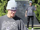 *EXCLUSIVE* Sherman Oaks, CA - A 'punk rocker' looking Justin Bieber and his crew enjoyed a few rounds of miniature golf this afternoon at Castle Park.  Bieber wore a 'Slayer' band graphic tee, ripped jeans, white sneakers and displayed his various tattoos.\n  \nAKM-GSI       March 22, 2016\nTo License These Photos, Please Contact :\nSteve Ginsburg\n(310) 505-8447\n(323) 423-9397\nsteve@akmgsi.com\nsales@akmgsi.com\nor\nMaria Buda\n(917) 242-1505\nmbuda@akmgsi.com\nginsburgspalyinc@gmail.com
