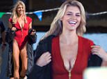 Tybee, GA - Kelly Rohrbach was spotted on set of the new reboot film, Baywatch. The blonde bombshell was wearing the iconic red swimsuit but looked to be a little cold as she put on a heavy coat. She looked fit and toned as she got ready to film.\nAKM-GSI      March 23, 2016\nTo License These Photos, Please Contact :\nSteve Ginsburg\n(310) 505-8447\n(323) 423-9397\nsteve@akmgsi.com\nsales@akmgsi.com\nor\nMaria Buda\n(917) 242-1505\nmbuda@akmgsi.com\nginsburgspalyinc@gmail.com