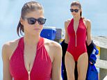 24.March.2016 - Tybee - USA\n*** STRICTLY AVAILABLE FOR UK AND GERMANY USE ONLY ***\nAlexandra Daddario looks stunning in the iconic red Baywatch one piece as she gets ready to film on set. \nBYLINE MUST READ : AKM-GSI-XPOSURE\n***UK CLIENTS - PICTURES CONTAINING CHILDREN PLEASE PIXELATE FACE PRIOR TO PUBLICATION ***\n*UK CLIENTS MUST CALL PRIOR TO TV OR ONLINE USAGE PLEASE TELEPHONE 0208 344 2007*\n