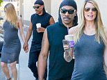 Picture Shows: Paige Butcher, Eddie Murphy  March 24, 2016\n \n Comedian Eddie Murphy and his pregnant girlfriend Paige Butcher stop by Coffee Bean in Studio City, California. Paige wore a grey dress that accentuated her baby bump.\n \n Non-Exclusive\n UK RIGHTS ONLY\n \n Pictures by : FameFlynet UK © 2016\n Tel : +44 (0)20 3551 5049\n Email : info@fameflynet.uk.com