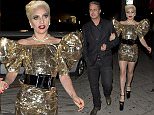 Lady Gaga and her fiancÈ Taylor Kinney were seen walking two full blocks to 'No Name ' Restaurant to celebrate Gaga's birthday party in Los Angeles, CA. A man was seen arriving with a piece of Artwork that gaga requested that was drawn by Michael Jackson and valued at $2 Million dollars. Gaga was wearing very large wedge heel shoes and a Gold Dress with wings on the shoulders while Taylor opted for a nice dress suit.\n\nPictured: Lady Gaga, Taylor Kinney\nRef: SPL1252756  270316  \nPicture by: SPW / TwisT / Splash News\n\nSplash News and Pictures\nLos Angeles: 310-821-2666\nNew York: 212-619-2666\nLondon: 870-934-2666\nphotodesk@splashnews.com\n