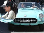 Beverly Hills,  CA - Kendall Jenner is seen driving her 56 Corvette out of the gym with friend Hailey Baldwin then going to grab some food at a grocery store. She also flips the bird to cameras, she's not too happy about being photographed.\n  \nAKM-GSI       March 26, 2016\nTo License These Photos, Please Contact :\nSteve Ginsburg\n(310) 505-8447\n(323) 423-9397\nsteve@akmgsi.com\nsales@akmgsi.com\nor\nMaria Buda\n(917) 242-1505\nmbuda@akmgsi.com\nginsburgspalyinc@gmail.com