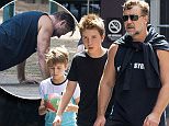 26 MARCH 2016 SYDNEY AUSTRALIA\nEXCLUSIVE PICTURES\nRussell Crowe pictured with his son's Charlie and Tennyson taking a walk around Woolloomooloo and Potts Point - at one point stopping off to pass the footy around and do some push ups.