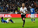 MUNICH, BAVARIA - MARCH 29:  Mario Goetze of Germany celebrates after scoring the second goal during the International Friendly match between Germany and Italy at Allianz Arena on March 29, 2016 in Munich, Germany.  (Photo by Dennis Grombkowski/Bongarts/Getty Images)