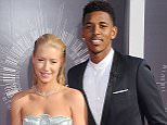 INGLEWOOD, CA - AUGUST 24: Singer Iggy Azalea and Nick Young arrive at the 2014 MTV Video Music Awards at The Forum on August 24, 2014 in Inglewood, California.  (Photo by Gregg DeGuire/WireImage)