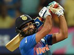 India's Rohit Sharma plays a shot during the World T20 cricket tournament semi-final match between India and West Indies at The Wankhede Cricket Stadium in Mumbai on March 31, 2016. / AFP PHOTO / PUNIT PARANJPEPUNIT PARANJPE/AFP/Getty Images