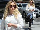 Beverly Hills, CA - Hilary Duff keeps it casual after shopping at Intermix. The singer was looking sporty with a white sweater, a denim button up tied around her waist, black leggings, and black sneakers.\nAKM-GSI      April 1, 2016\nTo License These Photos, Please Contact :\nSteve Ginsburg\n(310) 505-8447\n(323) 423-9397\nsteve@akmgsi.com\nsales@akmgsi.com\nor\nMaria Buda\n(917) 242-1505\nmbuda@akmgsi.com\nginsburgspalyinc@gmail.com