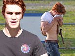 *EXCLUSIVE* Mission, BC - First look at New Zealander actor KJ Apa shooting scenes and bringing Archie Andrews to life for new show based on Archie Comics called 'Riverdale'. To get prepared for his scenes, KJ gets wired under his white t-shirt and then got a spray down to make him look sweaty for a scene where he wipes his sweat away with his shirt meeting up with actress Sarah Habel who portrays Geraldine Grundy.\nAKM-GSI         March 30, 2016\nTo License These Photos, Please Contact :\nSteve Ginsburg\n(310) 505-8447\n(323) 423-9397\nsteve@akmgsi.com\nsales@akmgsi.com\nor\nMaria Buda\n(917) 242-1505\nmbuda@akmgsi.com\nginsburgspalyinc@gmail.com