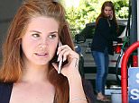 Picture Shows: Lana Del Rey  April 01, 2016\n \n 'Ultraviolence' singer Lana Del Rey was seen stopping to pump some gas at a gas station in Beverly Hills, California. Lana recently released 'Honeymoon' her fourth studio album, to critical acclaim. \n \n Non-Exclusive\n UK RIGHTS ONLY\n \n Pictures by : FameFlynet UK © 2016\n Tel : +44 (0)20 3551 5049\n Email : info@fameflynet.uk.com