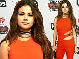 Singer Selena Gomez poses at the 2016 iHeartRadio Music Awards in Inglewood, California, April 3, 2016. REUTERS/Danny Moloshok