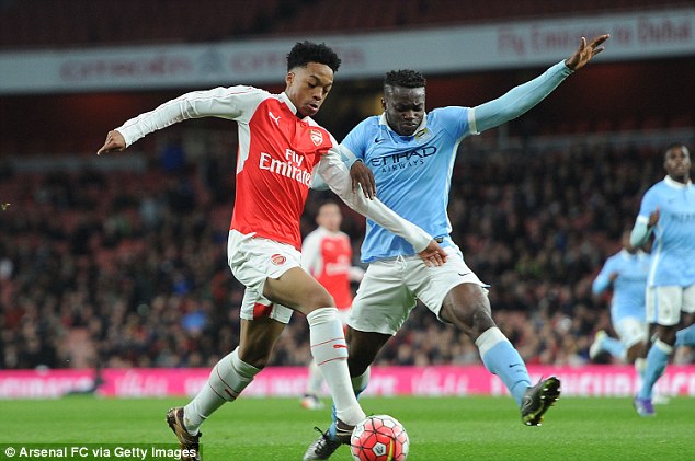 Arsenal winger Chris Willock vies for possession alongside City's Rodney Kongolo in the 2-2 draw 