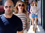 *EXCLUSIVE* Los Angeles, CA - Hollywood couple Rosie Huntington-Whiteley and Jason Statham stop by their favorite grocery store on this Sunday afternoon to stock top on fresh items. The blonde babe wore a cute colored striped sweater with Daisy Dukes showing off her long legs and beige suede fringe booties, while her man kept it simple with a navy blue tee and gray jeans.\nAKM-GSI     April 3, 2016\nTo License These Photos, Please Contact :\nSteve Ginsburg\n(310) 505-8447\n(323) 423-9397\nsteve@akmgsi.com\nsales@akmgsi.com\nor\nMaria Buda\n(917) 242-1505\nmbuda@akmgsi.com\nginsburgspalyinc@gmail.com