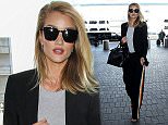 Los Angeles, CA - Supermodel Rosie Huntington-Whiteley looks elegant and classy in a black blazer and trousers as heads through LAX airport to fly out of town.\nAKM-GSI   March 5, 2016\n \n To License These Photos, Please Contact :\n \n Steve Ginsburg\n (310) 505-8447\n (323) 423-9397\n steve@akmgsi.com\n sales@akmgsi.com\n \n or\n \n Maria Buda\n (917) 242-1505\n mbuda@akmgsi.com\n ginsburgspalyinc@gmail.com