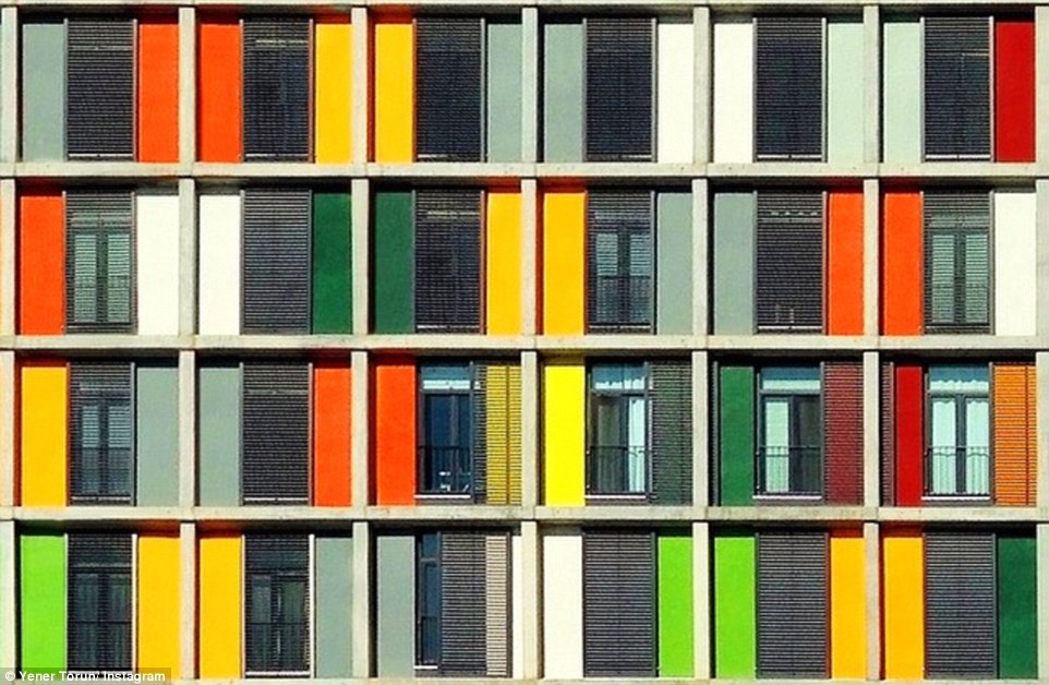 Entitled 'Overlap', the colourful shutter give this otherwise standard apartment block a fun flash of colour