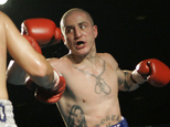 FILE- In this file photo from Nov. 22, 2006, Paul Spadafora boxes against Jesus Francisco Zepeda in a bout in Erie, Pa. Spadafora was charged Thursday, April 7, 2016 with simple assault and harassment for allegedly throwing a 63-year-old woman to the ground in the parking lot outside a Pittsburgh-area bar. (AP Photo/Keith Srakocic, FILE)