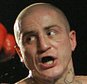 FILE- In this file photo from Nov. 22, 2006, Paul Spadafora boxes against Jesus Francisco Zepeda in a bout in Erie, Pa. Spadafora was charged Thursday, April 7, 2016 with simple assault and harassment for allegedly throwing a 63-year-old woman to the ground in the parking lot outside a Pittsburgh-area bar. (AP Photo/Keith Srakocic, FILE)