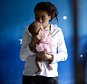 DENPASAR, BALI, INDONESIA - APRIL 21:  Heather Mack, 19, of the United States holds her baby daughter in a cell as she await her verdict hearing on April 21, 2015 in Denpasar, Bali, Indonesia. An Indonesian judge has sentenced Heather Mack to 10 years and her boyfriend Tommy Schaefer to 18 years in jail after they were found guilty of murdering Mack's mother, Sheila von Wiese-Mack, whose body was found stuffed inside a suitcase in the back of a taxi outside a luxury Bali hotel in August 2014. (Photo by Agung Parameswara/Getty Images)