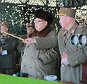 North Korean leader Kim Jong Un watches landing and anti-landing exercises being carried out by the Korean People's Army (KPA) at an unknown location, in this undated photo released by North Korea's Korean Central News Agency (KCNA) in Pyongyang on March 20, 2016.        REUTERS/KCNA    ATTENTION EDITORS - THIS PICTURE WAS PROVIDED BY A THIRD PARTY. REUTERS IS UNABLE TO INDEPENDENTLY VERIFY THE AUTHENTICITY, CONTENT, LOCATION OR DATE OF THIS IMAGE. FOR EDITORIAL USE ONLY. NOT FOR SALE FOR MARKETING OR ADVERTISING CAMPAIGNS. NO THIRD PARTY SALES. NOT FOR USE BY REUTERS THIRD PARTY DISTRIBUTORS. SOUTH KOREA OUT. NO COMMERCIAL OR EDITORIAL SALES IN SOUTH KOREA. THIS PICTURE IS DISTRIBUTED EXACTLY AS RECEIVED BY REUTERS, AS A SERVICE TO CLIENTS.