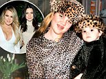Khloe Kardashian\nCredit: www.KhloeWithAK.com\n#TBT: Baby Kendall, Braces and Bad Outfits (image attached)\nUm, how come no one told me braces + all-over animal print wasn't a good look?! Leopard overload!!! But, how cute is Kendall?\n