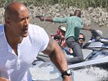 Exclusive... 52014941 Actor Dwayne 'The Rock' Johnson films an intense action scene in the ocean for the upcoming movie 'Baywatch' on April 6, 2016 in Savannah, Georgia. During the scene Dwayne chased bad guys on his boat while they shot at him. FameFlynet, Inc - Beverly Hills, CA, USA - +1 (310) 505-9876