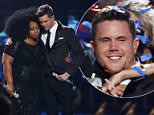 Singers La'Porsha Renae and Trent Harmon wait to hear show host Ryan Seacrest announce the winner during the American Idol Grand Finale in Hollywood, California April 7, 2016.  REUTERS/Mario Anzuoni