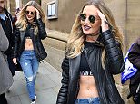 Little Mix star Perrie Edwards shows off her toned abbs in a crop top as she and band members Leigh Ann Pinnock and Jade Thirwell leave their Manchester Hotel ahead of their show in the city tonight