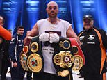 Tyson Fury celebrates with belts as he defeats Wladimir Klitschko to become new World Heavyweight Champion after the IBF IBO WBA WBO Heavyweight World Championship contest at Esprit-Arena on November 28, 2015 in Duesseldorf, Germany.  

DUESSELDORF, GERMANY - NOVEMBER 28.
(Photo by Lars Baron/Bongarts/Getty Images)