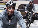 EXCLUSIVE: Hugh Jackman seen riding his bicycle on a rainy day in New York City on April 7, 2016.\n\nPictured: Hugh Jackman\nRef: SPL1239734  070416   EXCLUSIVE\nPicture by: GSNY /Splash News\n\nSplash News and Pictures\nLos Angeles: 310-821-2666\nNew York: 212-619-2666\nLondon: 870-934-2666\nphotodesk@splashnews.com\n