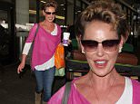 Los Angeles, CA - Katherine Heigl arrives at LAX looking bright and happy but tries and cover her face from cameras. She quickly gives up and just flashes her big smile instead. \nAKM-GSI     April 12, 2016\nTo License These Photos, Please Contact :\nSteve Ginsburg\n(310) 505-8447\n(323) 423-9397\nsteve@akmgsi.com\nsales@akmgsi.com\nor\nMaria Buda\n(917) 242-1505\nmbuda@akmgsi.com\nginsburgspalyinc@gmail.com