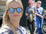 Santa Monica, CA - Reese Witherspoon rocks a blue ensemble for a skin care clinic visit in Santa Monica. Reese smiled for the cameras in flared blue jeans, strappy heels, a blue floral print top and blue mirrored shades as she returned to her car.\n \nAKM-GSI  April  12, 2016\nTo License These Photos, Please Contact :\nSteve Ginsburg\n(310) 505-8447\n(323) 4239397\nsteve@ginsburgspalyinc.com\nsales@ginsburgspalyinc.com\nor\nMaria Buda\n(917) 242-1505\nmbuda@akmgsi.com\nginsburgspalyinc@gmail.com