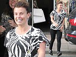 14.4.16..... OFF ON ANOTHER HOLIDAY COLEEN?.........Coleen Rooney makes an early evening dash to Rumpus Resort bikini shop in Wilmslow town centre on Thursday at about 5.30pm.