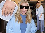 Iggy Azalea is seen at LAX in Los Angeles, California.

Pictured: Iggy Azalea
Ref: SPL1268729  210416  
Picture by: GVK/Bauergriffin.com