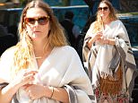 EXCLUSIVE: Drew Barrymore looks comfortable covering up on a sunny day wearing a poncho as she enjoys the day with a girlfriend in New York City. Drew seemed to be in good spirits. \n\nPictured: Drew Barrymore\nRef: SPL1269281  230416   EXCLUSIVE\nPicture by: PC-NWP / Splash News\n\nSplash News and Pictures\nLos Angeles: 310-821-2666\nNew York: 212-619-2666\nLondon: 870-934-2666\nphotodesk@splashnews.com\n