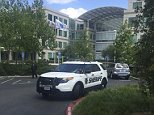 A Santa Clara county Sheriff's Office vehicle is shown parked outside one of the main office buildings of the Apple campus in Cupertino, California, April 27, 2016.  An Apple employee was found dead on Wednesday, according to police, and local media was reporting that the victim had suffered a head wound and a gun discovered near his body.  REUTERS/Julie Love