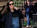 Pregnant Liv Tyler, wearing jean overalls and red lipstick, runs errands in New York City on April 28, 2016\n\nPictured: Liv Tyler\nRef: SPL1271927  280416  \nPicture by: Christopher Peterson/Splash News\n\nSplash News and Pictures\nLos Angeles: 310-821-2666\nNew York: 212-619-2666\nLondon: 870-934-2666\nphotodesk@splashnews.com\n