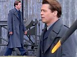 Picture Shows: Brad Pitt  April 27, 2016\n \n * Min Web / Online Fee £250 For Set *\n \n \n Extra's are lined up during a pause in production while an extra is chosen as a last minute look-a-like is required for filming on the set of 'Allied' in the Oxfordshire countryside in England, UK. \n \n Actor Brad Pitt can be seen strolling across the set while the extra is being chosen. \n \n "Allied" is an upcoming romantic thriller film based on the true story about two assassins who fall in love during a mission to kill a German official. \n \n * Min Web / Online Fee £250 For Set *\n \n Exclusive All Rounder\n WORLDWIDE RIGHTS\n Pictures by : FameFlynet UK © 2016\n Tel : +44 (0)20 3551 5049\n Email : info@fameflynet.uk.com