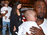 Kim Kardashian and Kanye West arrive with Saint West as the baby makes first public appearance to the Parque Central hotel in Cuba. The couple had just arrived¿on Tuesday¿night for their first family visit to the country.