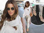 Los Angeles, CA - Kate Beckinsale slips out of town in silk pants and a large scarf with heels, on Friday evening with her bodyguard close behind.\n \n AKM-GSI   May  6, 2016\nTo License These Photos, Please Contact :\nSteve Ginsburg\n(310) 505-8447\n(323) 423-9397\nsteve@akmgsi.com\nsales@akmgsi.com\nor\nMaria Buda\n(917) 242-1505\nmbuda@akmgsi.com\nginsburgspalyinc@gmail.com