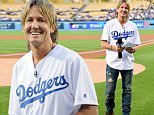 LOS ANGELES, CA - MAY 09:  Singer Keith Urban announces the starting lineup for the Los Angeles Dodgers before the game against the New York Mets at Dodger Stadium on May 09, 2016 in Los Angeles, California.  (Photo by Harry How/Getty Images)