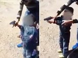 Pic shows: The father ans son with a gun.\n\nThis video of a proud Turkish dad teaching his son how to shoot a handgun has caused heated debate online.\n\nThe proud dad, who was only identified in local media by his initials F.B., said to the child as he gave him the gun: "Come on, show me that you are your fatherøs son".\n\nThe incident is believed to have taken place on the outskirts of Korfez, a town in Turkeyøs north-western region of Marmara.\n\nThe footage shows the delighted dad giving the silver handgun to the little boy to teach him how to shoot.\n\nHe first loads the gun and then hands it to the child, who appears not to realise that he is holding a dangerous weapon.\n\nThe father then instructs him to hold the gun with both of his hands and the boy, who looks no more than five years old, then slowly raises the firearm before blasting off five shots into the distance.\n\nThe father cheers with every shot he takes, each time shouting: "Pull the trigger, pull it!"\n\nAfter the
