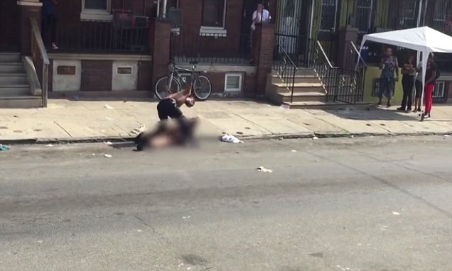 Philadelphia people watch as woman is horrifically beaten in broad daylight by a man