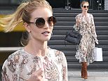 Picture Shows: Rosie Huntington-Whiteley  May 16, 2016\n \n **Min £200 Set Online / Web Usage Fee**\n \n British Model and Designer Rosie Huntington-Whiteley seen leaving the M&S headquarters in London, England. \n \n The English model was dressed in Zimmermann and wearing Jimmy Choo ANDIE/S sunglasses with her Celine belt bag.\n \n **Min £200 Set Online / Web Usage Fee**\n \n Exclusive - All Round\n WORLDWIDE RIGHTS\n \n Pictures by : FameFlynet UK © 2016\n Tel : +44 (0)20 3551 5049\n Email : info@fameflynet.uk.com
