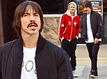 EXCLUSIVE:  ** PREMIUM EXCLUSIVE RATES APPLY**  Anthony Kiedis leaves a sushi restaurant with his Red Hot Chili Peppers bandmate Flea after being hospitalised with a stomach bug. Kiedis, whose illness forced the band to cancel two California concerts, appeared healthy as he was spotted in Malibu with Michael Peter Balzary, a.k.a. Flea. The rockers were seen heading back to their cars after a quick meeting and a bite to eat at a Sushi restaurant on May 15, 2016. Kiedis was rushed to hospital the day before - May 14 - ahead of his band's performance at KROQ's Weenie Roast Festival in Irvine, California. His bandmates took to the stage to apologise to the 16,000-strong crowd. The group also cancelled their iHeart Radio concert in Burbank, which was due to take place on May 17.\n\nPictured: Anthony Kiedis, Michael Peter Balzary Aka 'Flea'\nRef: SPL1283494  160516   EXCLUSIVE\nPicture by: Sharpshooter Images / Splash \n\nSplash News and Pictures\nLos A