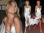Kimberley Garner is seen at the 69th Cannes film festival in a silk evening dress as she headed out to the town