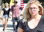 152306, Chloe Moretz and Brooklyn Beckham seen holding hands as they stroll down the street. The pair bought some water at a gas station after visiting a tattoo shop, possibly getting tattoos. Brooklyn could also be seen wearing the same clothes from his airport trip yesterday. Los Angeles, California - Tuesday May 16, 2016. Photograph: ¬© Sam Sharma, PacificCoastNews. Los Angeles Office: +1 310.822.0419 UK Office: +44 (0) 20 7421 6000 sales@pacificcoastnews.com FEE MUST BE AGREED PRIOR TO USAGE