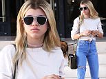 17.May.2016 - Beverly Hills ñ USA\n*** STRICTLY AVAILABLE FOR UK AND GERMANY USE ONLY ***\nBeverly Hills, CA - Sofia Richie stops by Barney's New York for some retail therapy. The 17-year-old model is wearing high waisted denim pants with a long sleeve white shirt paired with sneakers. Sofia's hair has grown out showing a couple inches of her natural color.\nBYLINE MUST READ : AKM-GSI-XPOSURE\n***UK CLIENTS - PICTURES CONTAINING CHILDREN PLEASE PIXELATE FACE PRIOR TO PUBLICATION ***\n*UK CLIENTS MUST CALL PRIOR TO TV OR ONLINE USAGE PLEASE TELEPHONE 0208 344 2007*\n