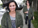 Picture Shows: Demi Lovato  May 18, 2016\n \n Singer Demi Lovato and her bodyguard are seen leaving her office in West Hollywood, California. Demi was in a good mood even taking pictures of the paparazzi as she made her way to the car.\n \n Non Exclusive\n UK RIGHTS ONLY\n \n Pictures by : FameFlynet UK © 2016\n Tel : +44 (0)20 3551 5049\n Email : info@fameflynet.uk.com