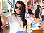 Kourtney Kardashian takes a selfie with her daughter Penelope while on a carousel ride at Disneyland. Little penelope also took a piggie back ride on her mom after their ride as they made their way to dinner.
Kourtney was seen spending time with Kim at the happiest place on earth

Pictured: Kourtney Kardashian and Penelope Disick
Ref: SPL1286195  190516  
Picture by: Fern /Splash News

Splash News and Pictures
Los Angeles: 310-821-2666
New York: 212-619-2666
London: 870-934-2666
photodesk@splashnews.com